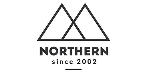 Car mechanic fills engine oil